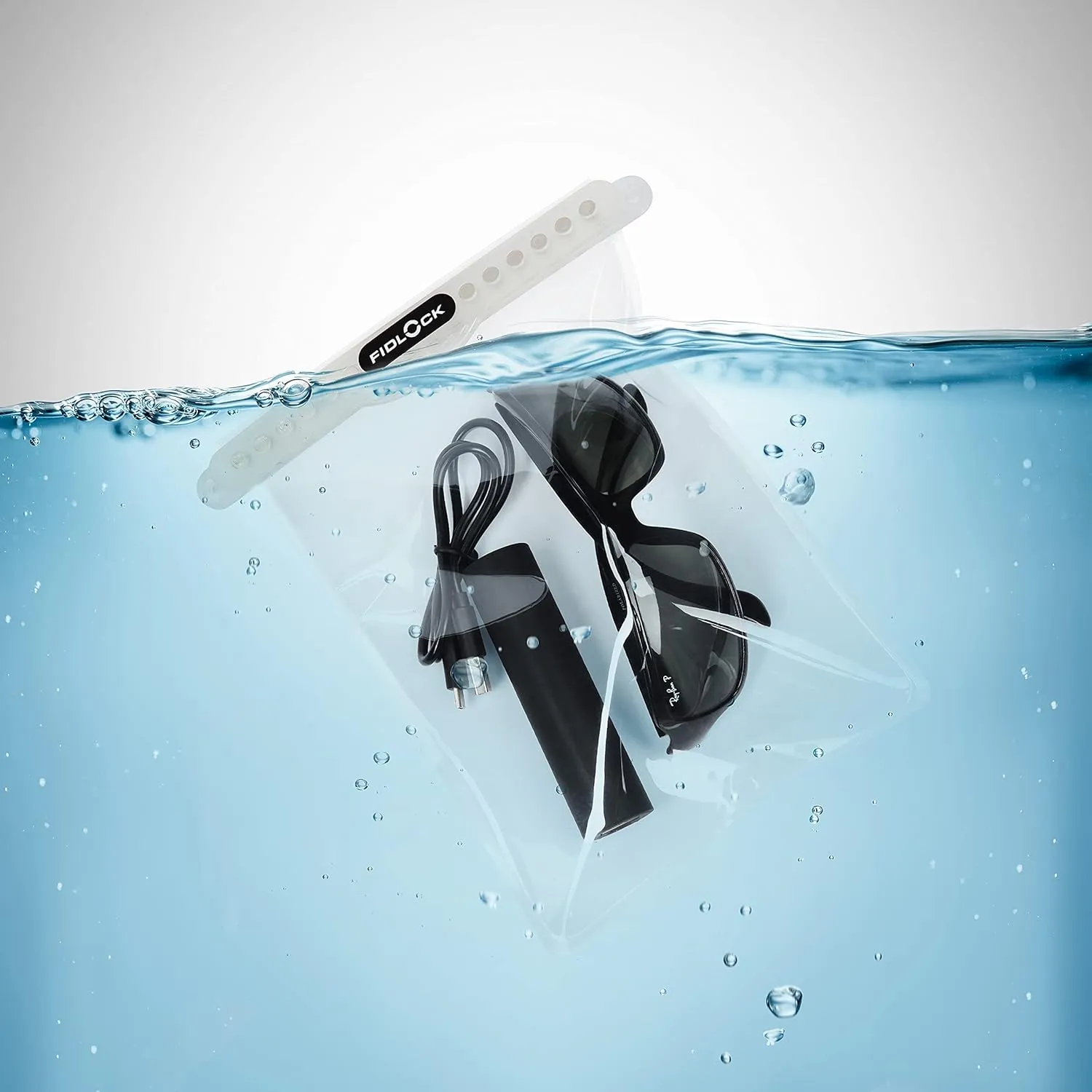 FIDLOCK Hermetic Dry Bag Maxi - Flexible Magnetic Self-Sealing Bag for Cellphone | 100% Waterproof and Sand Proof - Practical Size with a Large Opening, with Lanyard Included - Transparent