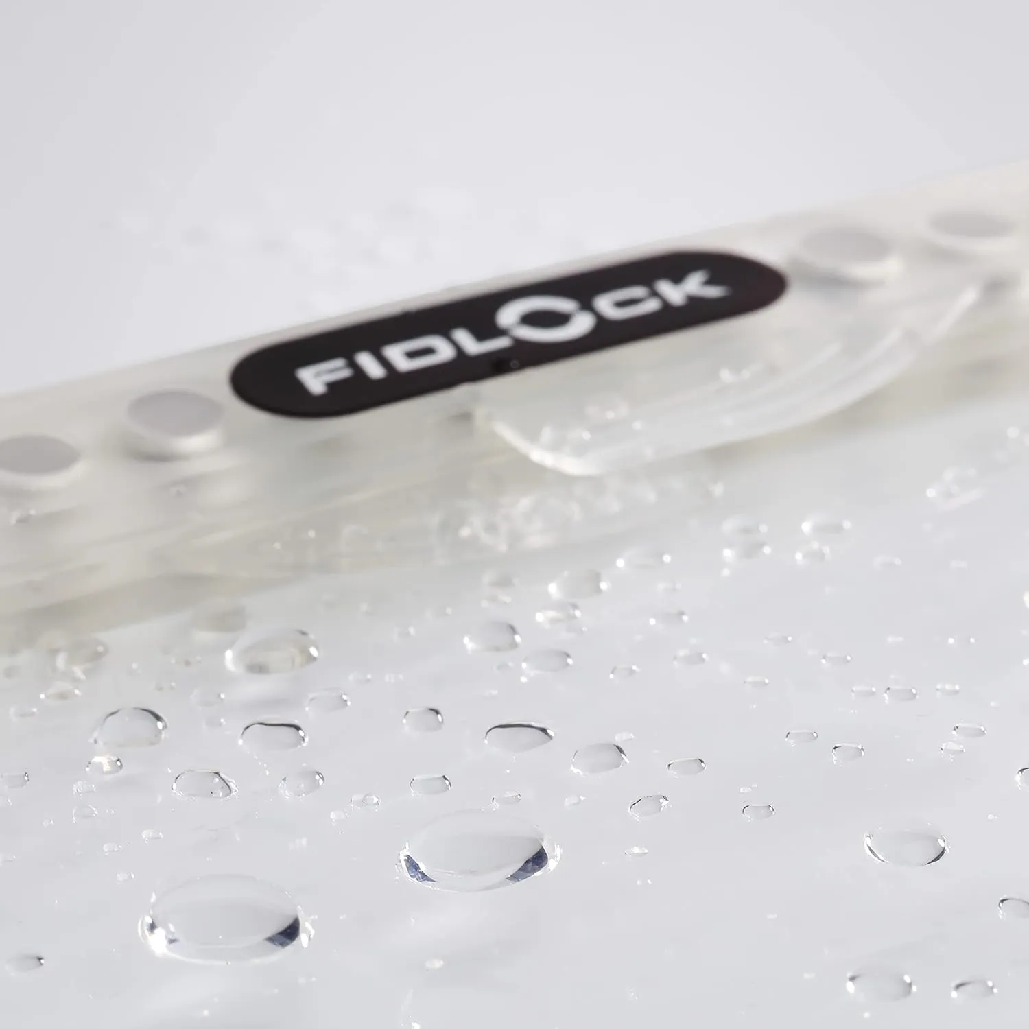 FIDLOCK Hermetic Dry Bag Maxi - Flexible Magnetic Self-Sealing Bag for Cellphone | 100% Waterproof and Sand Proof - Practical Size with a Large Opening, with Lanyard Included - Transparent